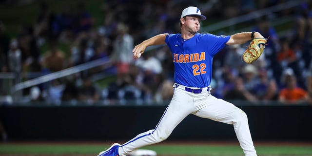 Brandon Neely #22 of the Florida Gators throws a pitch during a game against the Auburn Tigers at Condron Family Ballpark on April 1, 2023 in Gainesville, Florida.