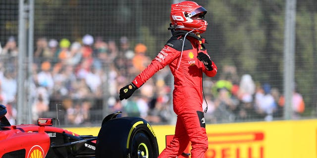 Charles Leclerc of Monaco and Ferrari climbs from his car after retiring from the race during the F1 Grand Prix of Australia at Albert Park Grand Prix Circuit on April 2, 2023, in Melbourne, Australia.