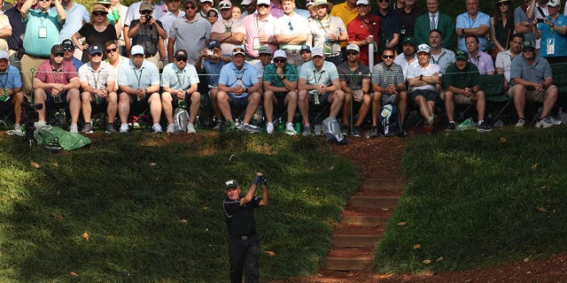 Gary Player plays a shot from the ninth tee during the Par 3 Contest prior to the 2023 Masters Tournament at Augusta National Golf Club in Augusta, Ga., on Wednesday.
