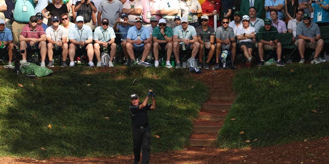 Gary Player plays a shot from the ninth tee during the Par 3 Contest prior to the 2023 Masters Tournament at Augusta National Golf Club in Augusta, Ga., on Wednesday.