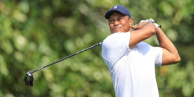Tiger Woods plays his tee shot on the fifth hole during the first round of the 2023 Masters Tournament at Augusta National Golf Club on April 6, 2023 in Augusta, Georgia.