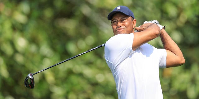 Tiger Woods plays his tee shot on the fifth hole during the first round of the 2023 Masters Tournament at Augusta National Golf Club on April 6, 2023 in Augusta, Georgia.