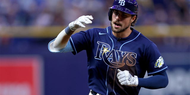 Josh Lowe of the Tampa Bay Rays rounds the bases after hitting a home run in the seventh inning during a game against the Boston Red Sox at Tropicana Field in St Petersburg, Florida, on Tuesday.