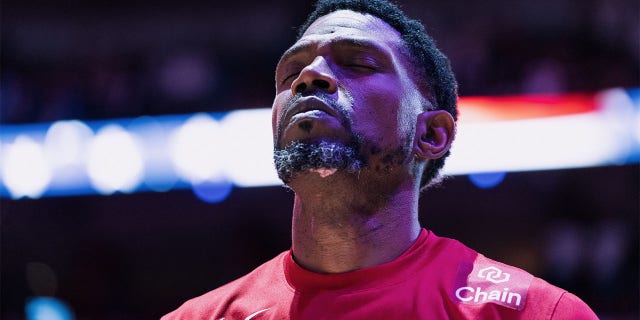 Udonis Haslem stands during the national anthem