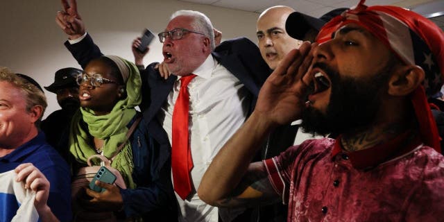 Critics of Manhattan District Attorney Alvin Bragg protest outside a House Judiciary Committee field hearing on violent crime in New York on April 17, 2023 at the Javits Federal Building in New York City.