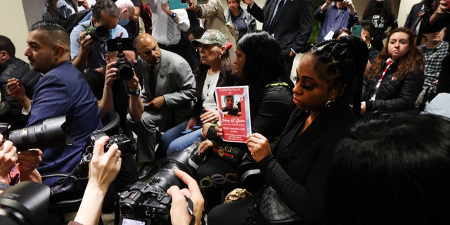 The family of recently murdered Johnny Gaston attends an open-air hearing for the House Judiciary Committee on New York Violent Crime at the Javits Federal Building in New York City on April 17, 2023. 