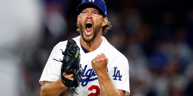 Clayton Kershaw, #22 of the Los Angeles Dodgers, reacts after making the third out against the New York Mets in the seventh inning at Dodger Stadium on April 18, 2023 in Los Angeles.