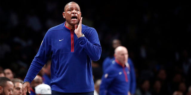 Doc Rivers yells toward his team in the playoffs