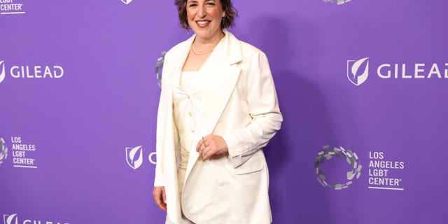 Mayim Bialik in a white suit