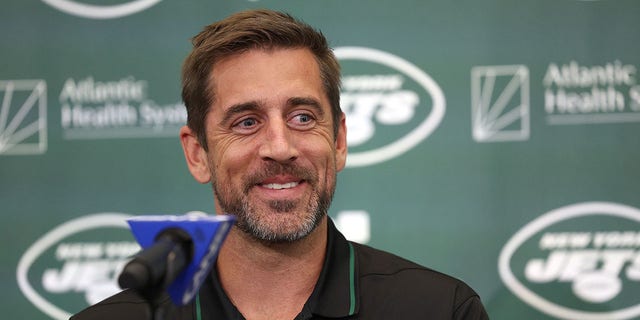 Aaron Rodgers attends an introductory press conference with the Jets