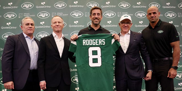 Jets owners pose for a photo