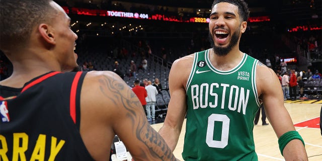 Jayson Tatum reacts after beating the Atlanta Hawks