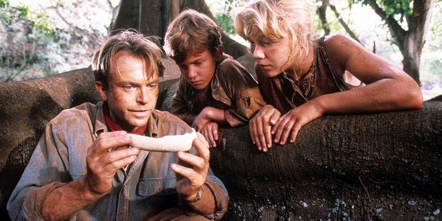 Sam Neill, Joseph Mazzello and Ariana Richards filming "Jurassic Park"