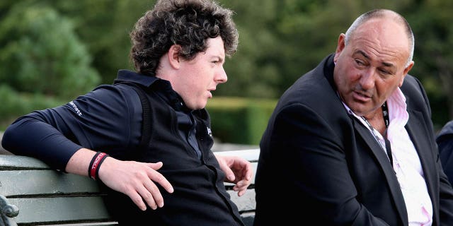 Rory McIlroy of Northern Ireland and his manager Andrew "Chubby" Chandler talk during the pro-am event prior to The Johnnie Walker Championship at Gleneagles Aug. 27, 2008, at the Gleneagles Hotel and Resort.