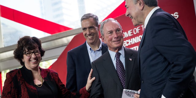 Martha Pollack, president of Cornell University, Daniel Huttenlocher, dean of Cornell Tech and former New York City Mayor Michael Bloomberg attend a dedication ceremony to mark the opening of the new campus of Cornell Tech on Roosevelt Island, September 13, 2017 in New York City.