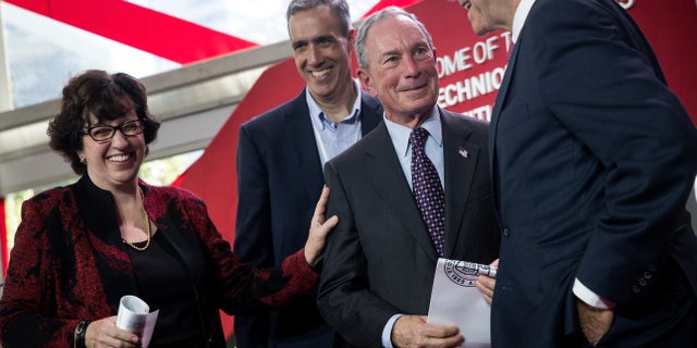 Martha Pollack, president of Cornell University, Daniel Huttenlocher, dean of Cornell Tech and former New York City Mayor Michael Bloomberg attend a dedication ceremony to mark the opening of the new campus of Cornell Tech on Roosevelt Island, September 13, 2017 in New York City.