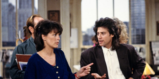 Jamie Lee Curtis and Richard Lewis in a scene from "Anything but Love"