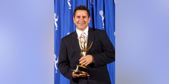Anthony LaPaglia poses with his Emmy Award after his win in 2002.