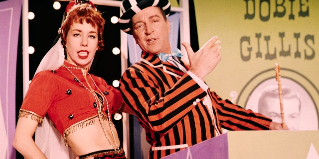 Carol Burnett in a two piece filming The Garry Moore Show