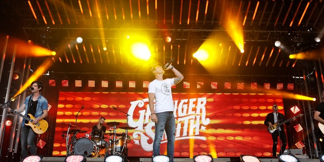 Granger Smith singing country music on stage