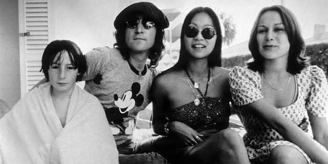 The couple brought Julian Lennon, left, to Disney World, where he and his father John Lennon got closer.
