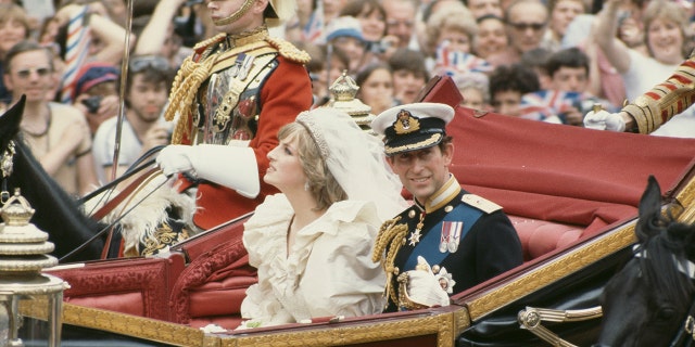 Princess Diana on a royal carriage during her wedding to Prince Charles