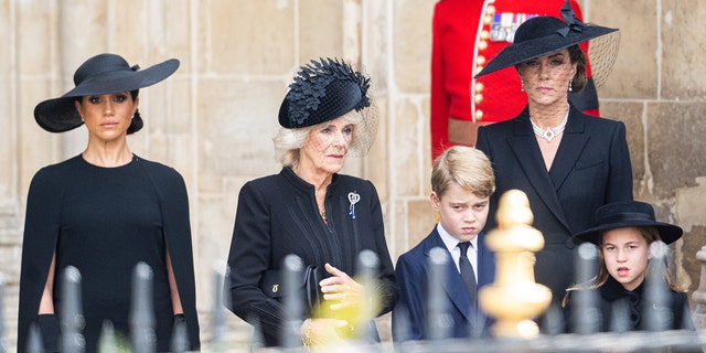 Meghan Markle, Camilla, Prince George, Princess Charlotte and Kate Middleton in mourning outfits during Queen Elizabeths funeral