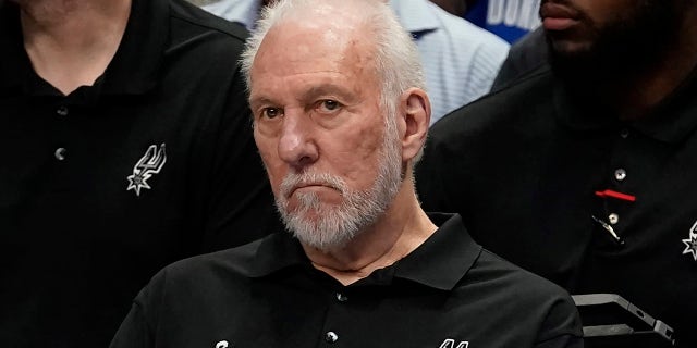 Gregg Popovich sits