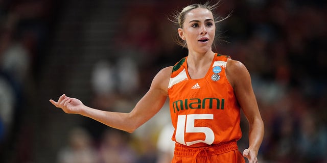 Hanna Cavinder of the Miami Hurricanes reacts during the Elite Eight round of the NCAA Women's Basketball Tournament game against the LSU Lady Tigers at Bon Secours Wellness Arena on March 26, 2023, in Greenville, South Carolina.