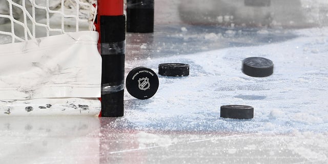 A general view of pucks during warm-ups prior to a game between the Dallas Stars and the Arizona Coyotes at Mullett Arena March 31, 2023, in Tempe, Ariz.