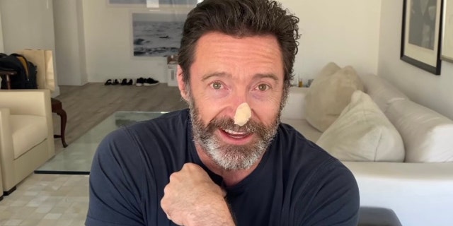 Hugh Jackman wanted to let his fans know why he has a bandage on his face.