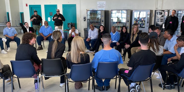 A group of Gen-Z influencers led by social media and reality star Kim Kardashian meets with inmates that the California state prison in Lancaster.