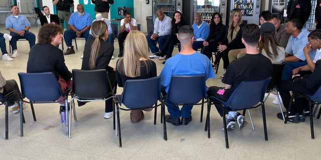 A group of Gen-Z influencers led by Kim Kardashian meets with inmates at the California state prison in Lancaster.