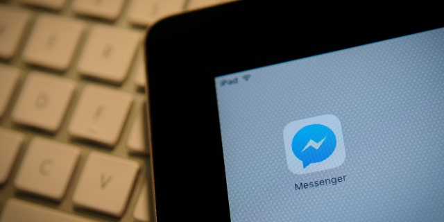 The Facebook Messenger application is seen on an iPad
