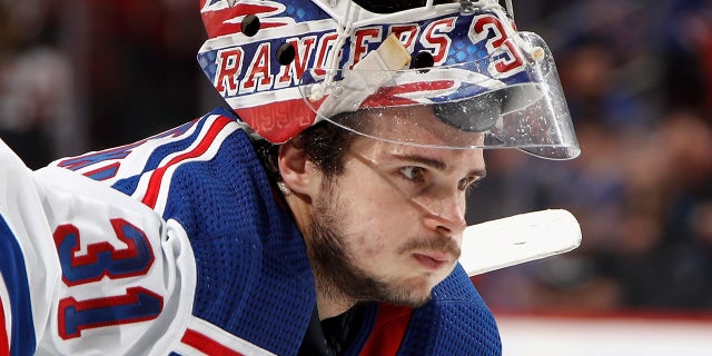 Igor Shesterkin reacts on the ice