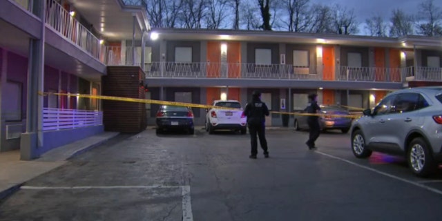 A 911 caller observed "a female open the front door" of room 116. She "appeared to be visibly in distress, and was yelling for help" when a Black male "then pulled the female back into the room and closed the door."