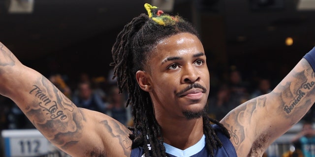 Ja Morant #12 of the Memphis Grizzlies reacts during Round 1 Game 1 of the NBA Playoffs against the Los Angeles Lakers on April 16, 2023 at FedExForum in Memphis, Tennessee.