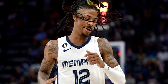Memphis Grizzlies guard Ja Morant, #12, plays in the first half of an NBA basketball game against the Portland Trail Blazers Tuesday, April 4, 2023, in Memphis, Tennessee.