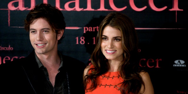 Jackson Rathbone and Nikki Reed attend a "Twilight" event.