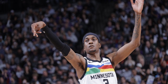 Jaden McDaniels #3 of the Minnesota Timberwolves holds his follow through during the game against the Sacramento Kings on March 27, 2023 at Golden 1 Center in Sacramento, California.