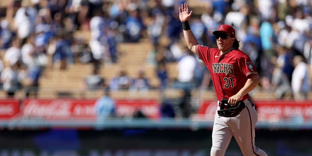 Jake McCarthy #31 of the Arizona Diamondbacks celebrate a 2-1 win over the Los Angeles Dodgers at Dodger Stadium on April 02, 2023, in Los Angeles, California. 