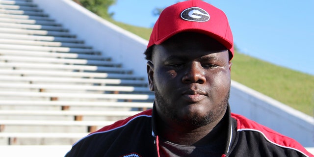 Jamaal Jarrett looks on with Georgia hat