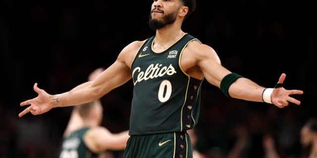 Jayson Tatum of the Boston Celtics celebrates during the second quarter of Game 1 of a first-round playoff series against the Atlanta Hawks at TD Garden April 15, 2023, in Boston.