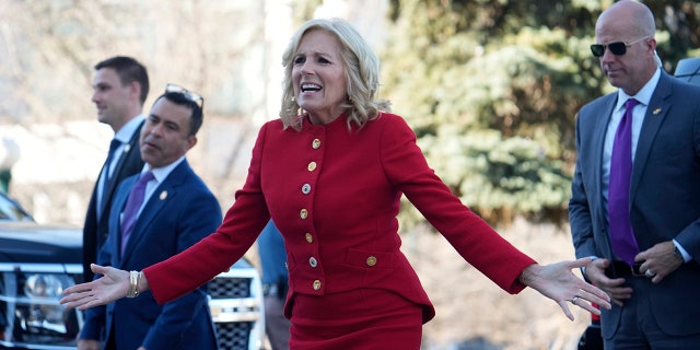 First lady Jill Biden greets lawmakers during a stop to attend a roundtable discussion on the federal workforce training program to help community college students earn certificates for entry-level jobs Monday, April 3, 2023, outside the State Capitol in Denver.