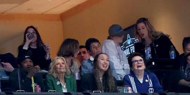 First lady Jill Biden, bottom center-left, looks on from a suite in the first half of the game between the LSU Lady Tigers and Iowa Hawkeyes during the final round of the Women's Final Four NCAA tournament at the American Airlines Center in Dallas April 2, 2023.