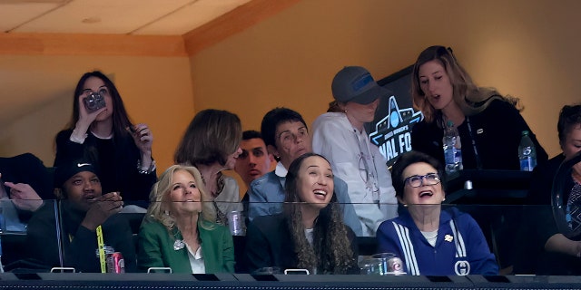 First lady Jill Biden, bottom center-left, looks on from a suite in the first half of the game between the LSU Lady Tigers and Iowa Hawkeyes during the final round of the Women's Final Four NCAA tournament at the American Airlines Center in Dallas April 2, 2023.