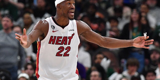 Miami Heat forward Jimmy Butler, #22, argues a second half call against the Milwaukee Bucks during Game 1 of the 2023 NBA Playoffs at the Fiserv Forum in Milwaukee on April 16, 2023.