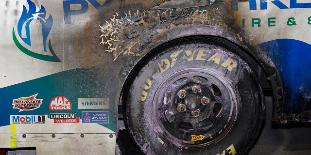 The burn damage to the #20 Pye Barker Fire and Safety Toyota, caused by flames from John Hunter Nemechek's burnout celebration at Martinsville Speedway on April 15, 2023.