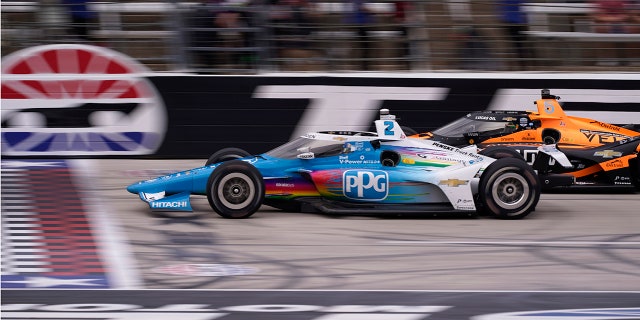 Josef Newgarden (2) and Pato O'Ward (5) of Mexico race through the final laps during the IndyCar race at Texas Motor Speedway in Fort Worth, Texas on Sunday, April 2, 2023. Newgarden won the race.