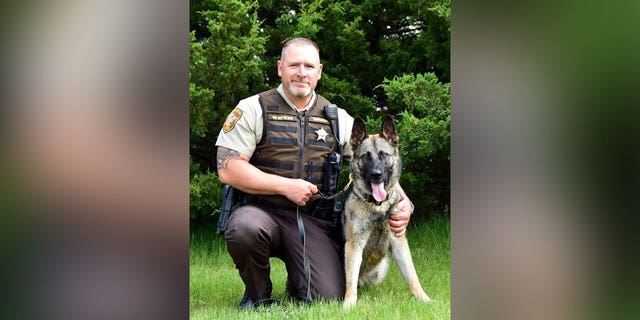 Pope County, Minnesota sheriffs office Deputy Josh Owens was killed in the line of duty on Saturday night. Also pictured is Owens canine, Karma.